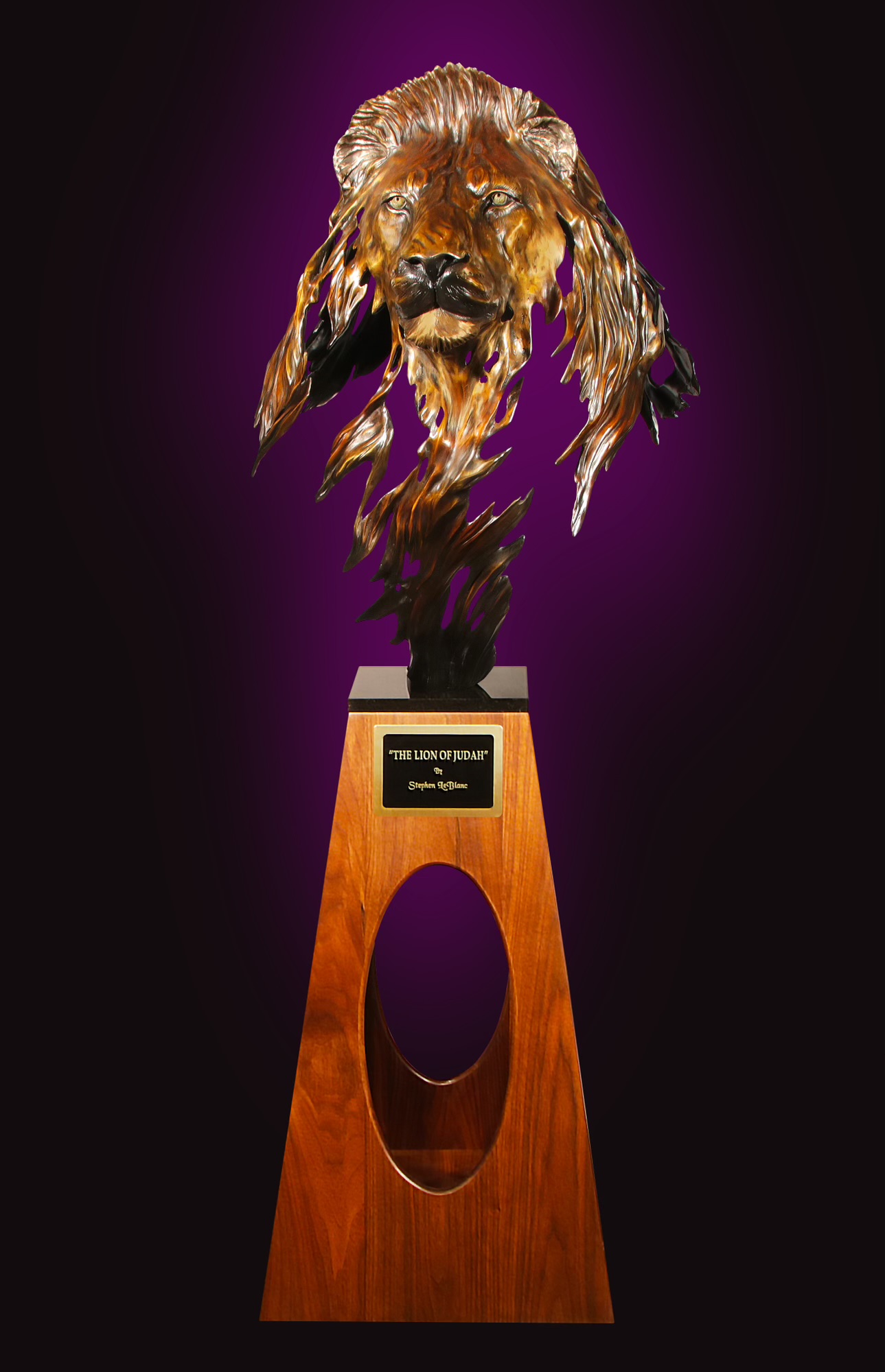 Full view of the bronze Lion of Judah sculpture on its wooden pedestal
